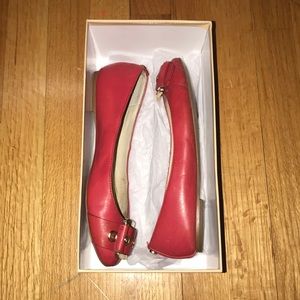 I’m selling these red Michael Kors shoes